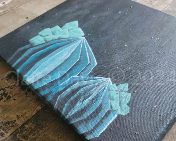 The "Crystal Cacti III" by Claire Davis, an 8"x10" acrylic painting from InkBird Print Studio LLC, beautifully embodies abstract art with its geometric shapes in shades of blue and teal set against a dark background. The canvas elegantly sits on a wooden surface, evoking the vivid and intricate design of crystal flowers.