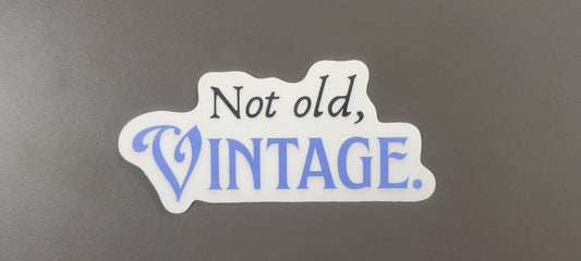 Sticker with 'Not old, VINTAGE.' text on a white background.