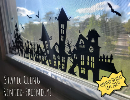 Our Spooky Town Halloween static cling window decoration, renter-friendly, screen-printed in black ink on clear cling material and contour cut, featuring haunted houses, eerie trees, bats, ghosts, and a moon, perfect for windows and glass surfaces. Also sold in Orange and White