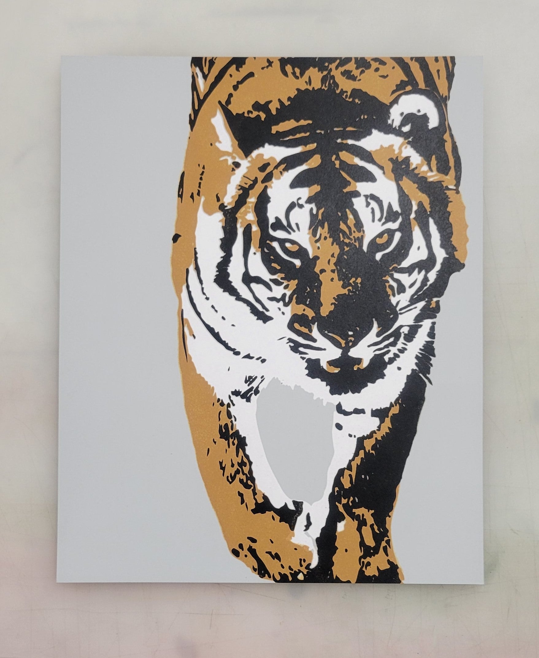 "Tiger I" a 3-color screen print by Claire Davis featuring a stylized tiger in bold, vibrant colors. 8x10 unframed print. Original photo, digital design, and printmaking by Claire Davis